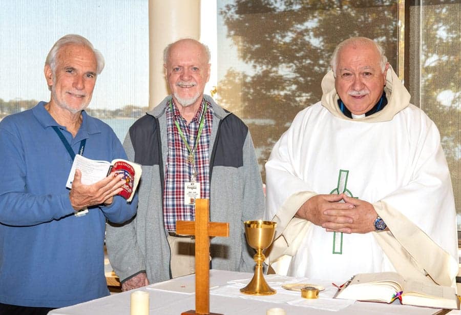 Clergy member with spiritual care volunteers at The Connecticut Hospice