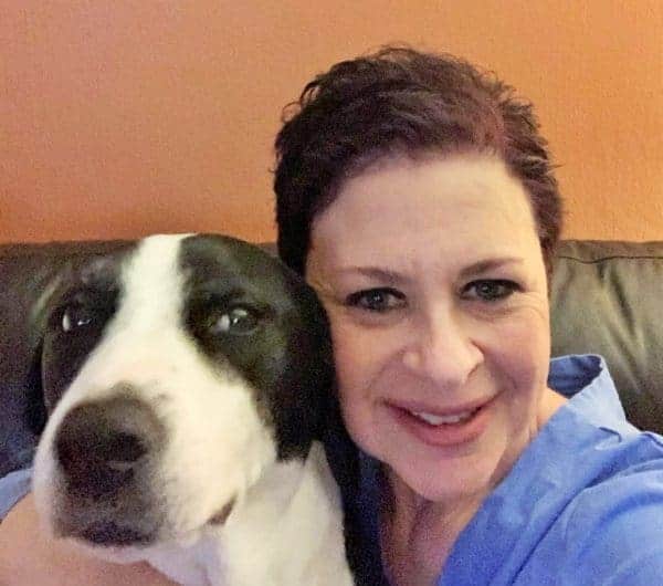 Head shot of Pet therapy volunteer and therapy dog