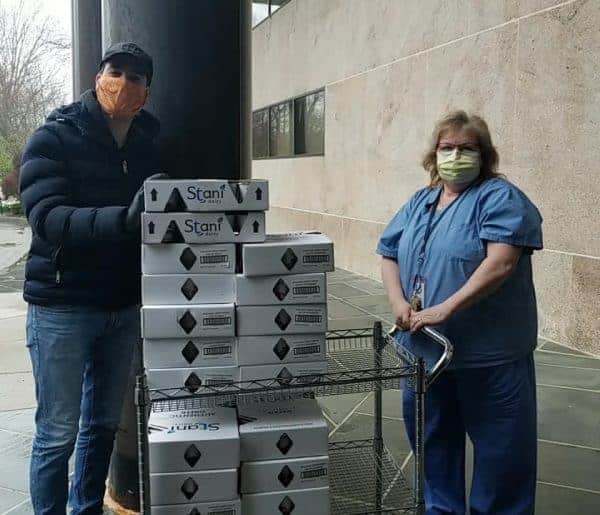 Connecticut Hospice staff member receives donation of cases of yogurt for staff