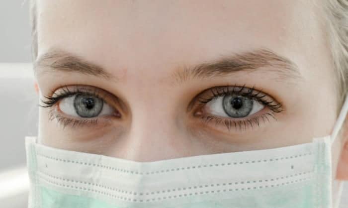 Close-up of nurse wearing a mask