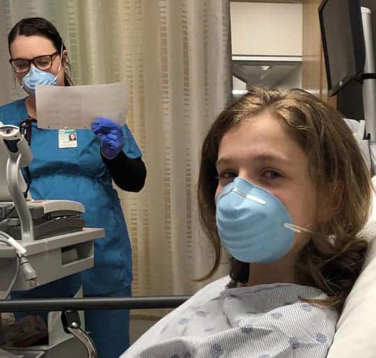 Connecticut Hospice Patiend and Nurse wearing protective masks