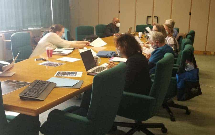 Interdisciplinary Teams meet to discuss hospice care