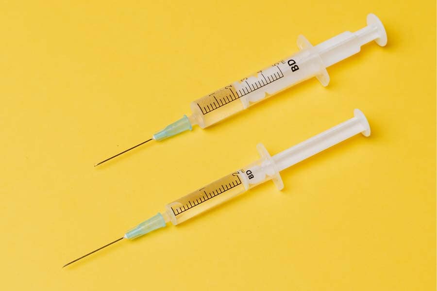 two hypodermic needles